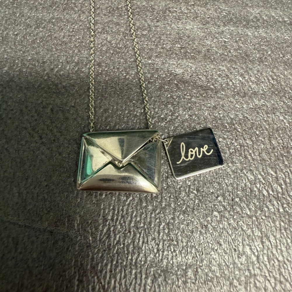 Tiffany & Co. RARE “Love is something to write home about” necklace